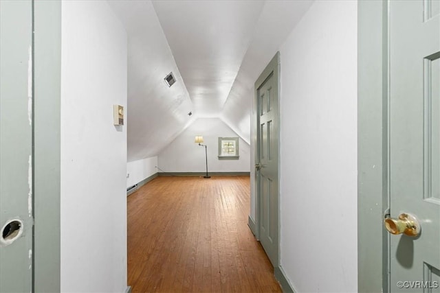 35161 Owens Grove Rd, Waverly, VA 23890 - additional living space featuring vaulted ceiling and hardwood / wood-style floors