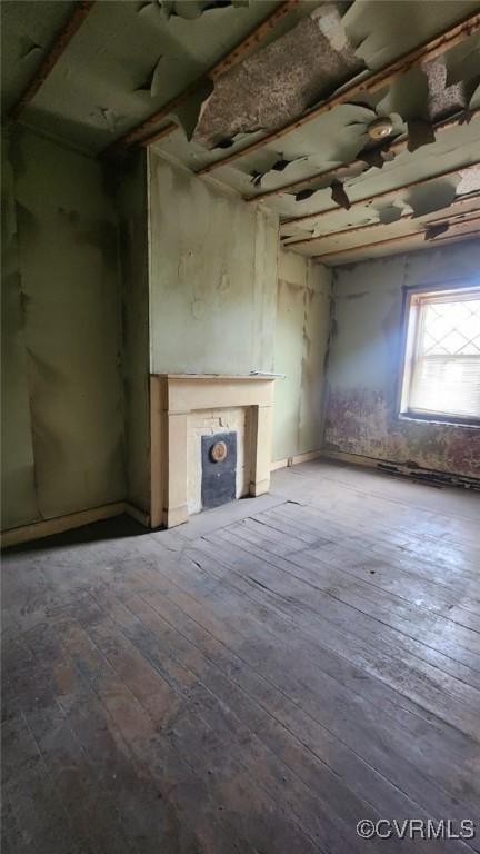 213 E Leigh St, Richmond, VA 23219 - unfurnished living room with hardwood / wood-style flooring