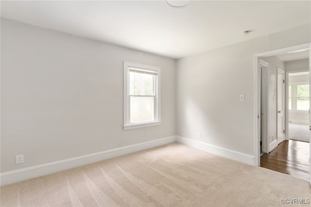 701 Nottoway Ave, Blackstone, VA 23824 - carpeted empty room with baseboards