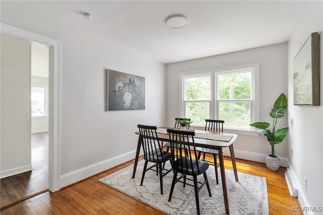 701 Nottoway Ave, Blackstone, VA 23824 - dining space with plenty of natural light, wood finished floors, and baseboards