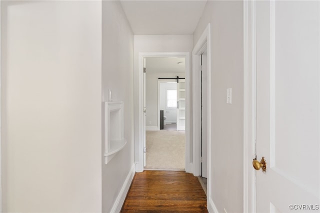 701 Nottoway Ave, Blackstone, VA 23824 - hall with baseboards and dark wood-type flooring