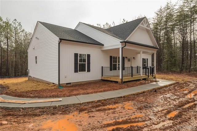 4373 Shannon Hill Rd, Columbia, VA 23038 - modern farmhouse featuring a porch, a shingled roof, and crawl space