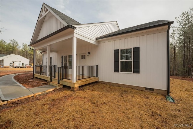 4373 Shannon Hill Rd, Columbia, VA 23038 - back of property featuring covered porch and roof with shingles