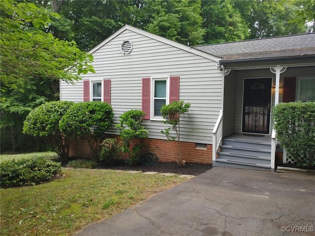view of front of home with crawl space