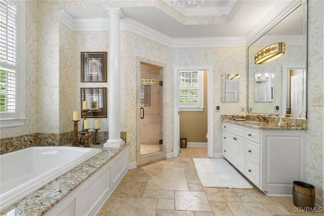 full bathroom featuring a bath, decorative columns, vanity, a shower stall, and crown molding