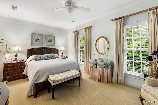 bedroom with light colored carpet, crown molding, multiple windows, and baseboards