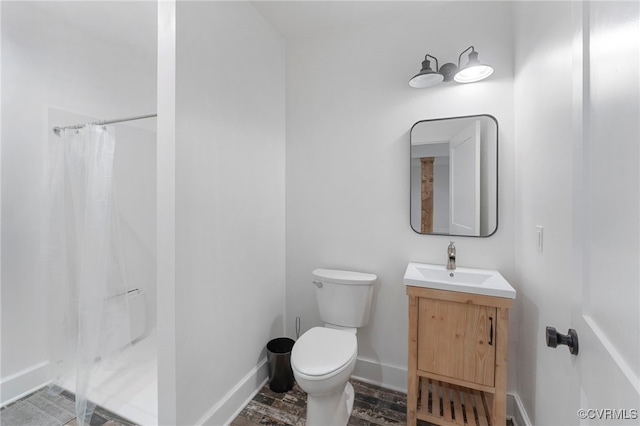 3162 Oak Hill Rd, Buckingham, VA 23921 - bathroom with a shower with curtain, toilet, vanity, and baseboards