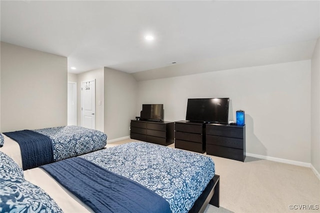 bedroom featuring light carpet, baseboards, and recessed lighting