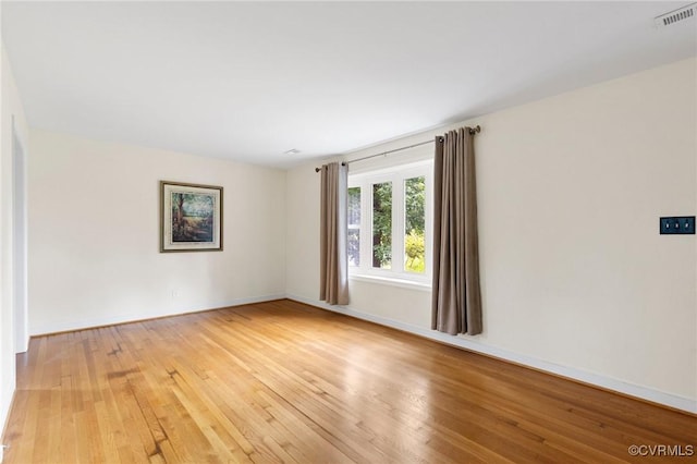 10970 Haverford Ln, North Chesterfield, VA 23236 - empty room featuring light wood-style floors and baseboards