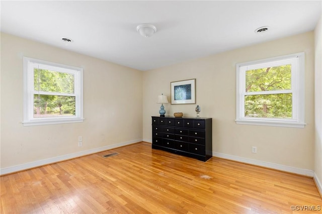 10970 Haverford Ln, North Chesterfield, VA 23236 - unfurnished bedroom featuring light wood-type flooring and baseboards