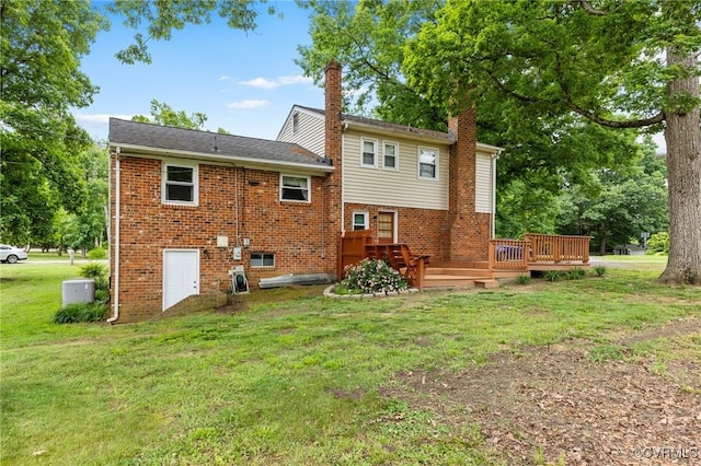 10970 Haverford Ln, North Chesterfield, VA 23236 - back of property featuring a yard, brick siding, a deck, and a chimney