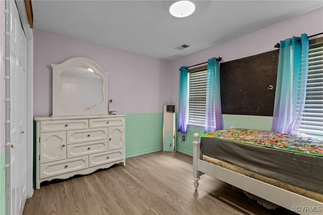 14125 Mountain Rd, Glen Allen, VA 23059 - bedroom featuring light wood-style floors and baseboards