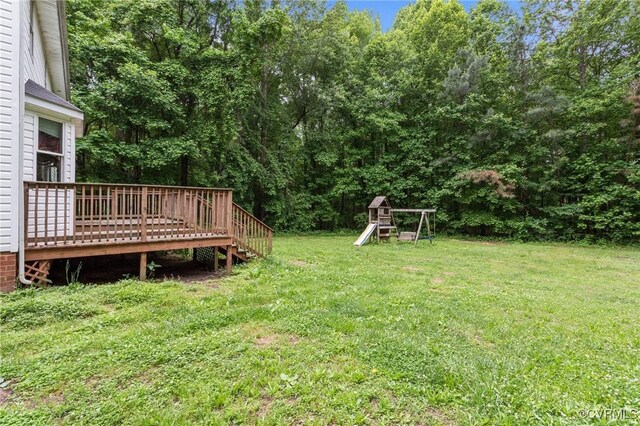 14125 Mountain Rd, Glen Allen, VA 23059 - view of grassy yard with a deck and a playground