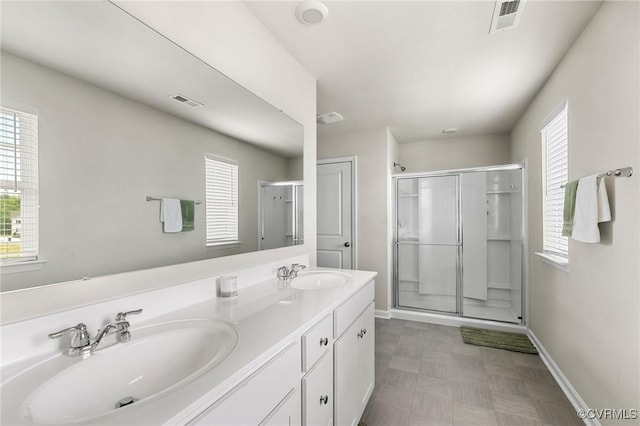 7007 Batten Ct, Chesterfield, VA 23234 - full bath with a stall shower, baseboards, and double vanity