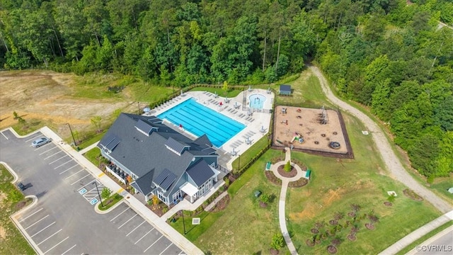 7007 Batten Ct, Chesterfield, VA 23234 - drone / aerial view of a pool area and a forest
