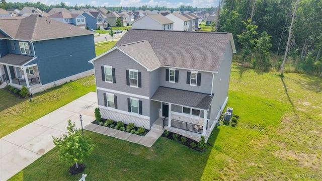 7007 Batten Ct, Chesterfield, VA 23234 - traditional home featuring a porch, a shingled roof, and a residential view