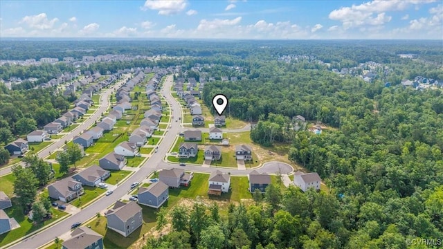 7007 Batten Ct, Chesterfield, VA 23234 - aerial view of property and surrounding area featuring a heavily wooded area and nearby suburban area