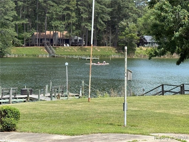 68 Family Ln, Cobbs Creek, VA 23035 - water view featuring a dock