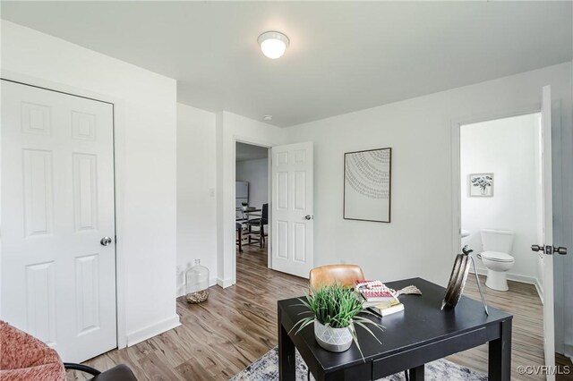 314 Maryland Ave, Hopewell, VA 23860 - home office featuring baseboards and light wood-style flooring