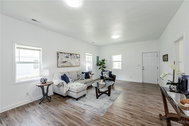 314 Maryland Ave, Hopewell, VA 23860 - living room with wood finished floors and baseboards