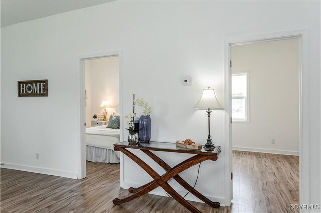 314 Maryland Ave, Hopewell, VA 23860 - hall featuring wood finished floors, baseboards, and a desk