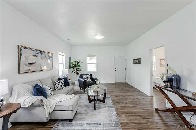 314 Maryland Ave, Hopewell, VA 23860 - living room featuring dark wood finished floors and baseboards