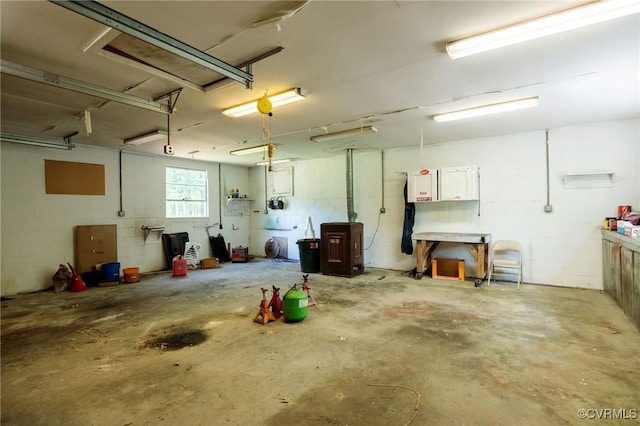 garage with concrete block wall