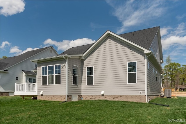 12543 N Readers Ln, Manakin Sabot, VA 23103 - back of property with cooling unit and a lawn