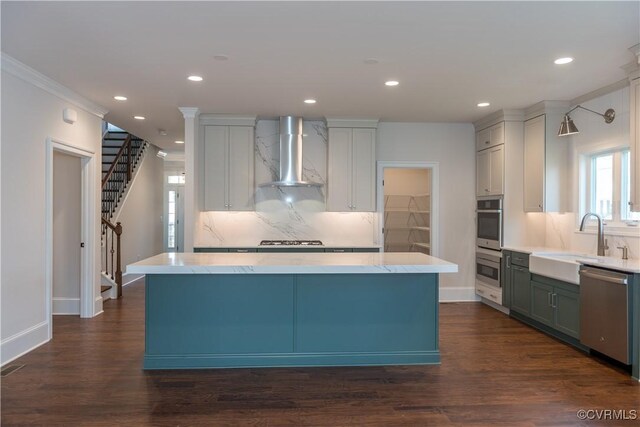 12543 N Readers Ln, Manakin Sabot, VA 23103 - kitchen with wall chimney exhaust hood, stainless steel dishwasher, a sink, tasteful backsplash, and baseboards
