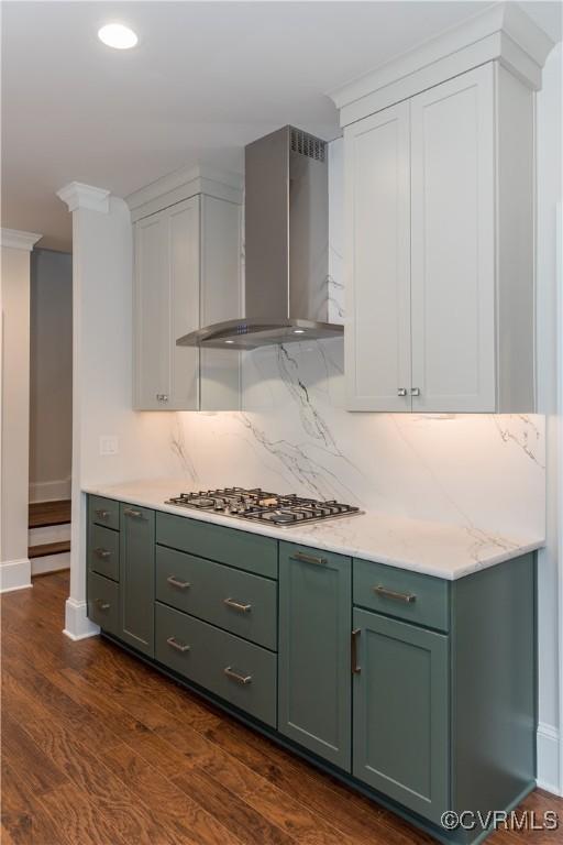 12543 N Readers Ln, Manakin Sabot, VA 23103 - kitchen with wall chimney range hood, green cabinets, stainless steel gas stovetop, white cabinets, and dark wood-type flooring