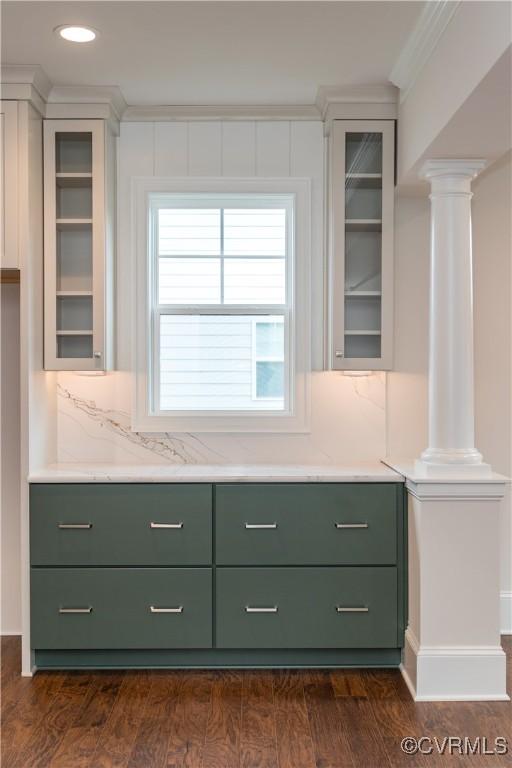 12543 N Readers Ln, Manakin Sabot, VA 23103 - kitchen featuring green cabinetry, ornate columns, crown molding, glass insert cabinets, and tasteful backsplash