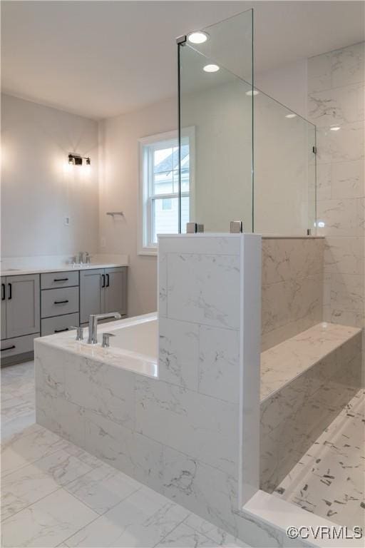 12543 N Readers Ln, Manakin Sabot, VA 23103 - full bathroom with a marble finish shower, a garden tub, marble finish flooring, and recessed lighting