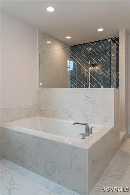 12543 N Readers Ln, Manakin Sabot, VA 23103 - bathroom featuring recessed lighting, a garden tub, a walk in shower, and marble finish flooring