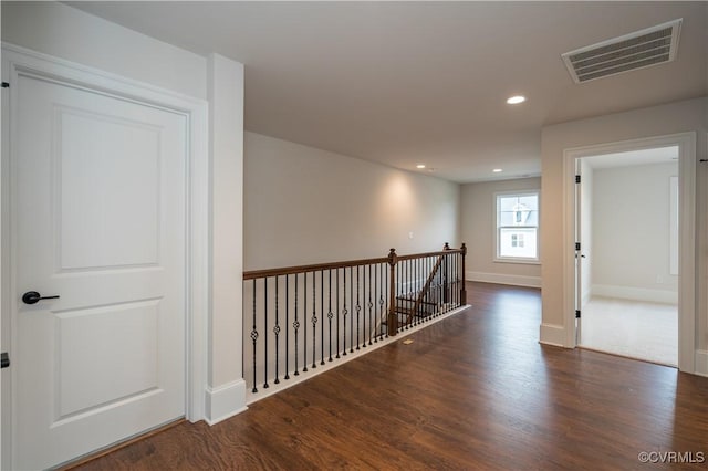 12543 N Readers Ln, Manakin Sabot, VA 23103 - hall featuring wood finished floors, recessed lighting, baseboards, and an upstairs landing