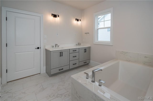 12543 N Readers Ln, Manakin Sabot, VA 23103 - full bath with marble look tiles, a bath, and double vanity