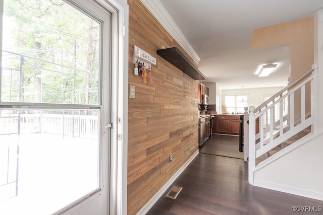 7418 Whirlaway Dr, Midlothian, VA 23112 - hall with wooden walls, dark wood finished floors, and stairs