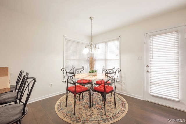 7418 Whirlaway Dr, Midlothian, VA 23112 - dining room featuring dark wood-style flooring, baseboards, and a chandelier