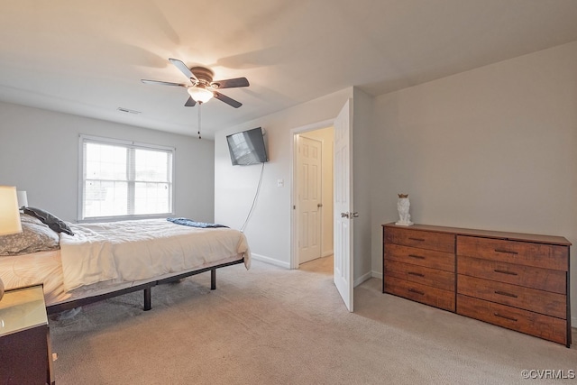 7418 Whirlaway Dr, Midlothian, VA 23112 - bedroom with light colored carpet, ceiling fan, and baseboards