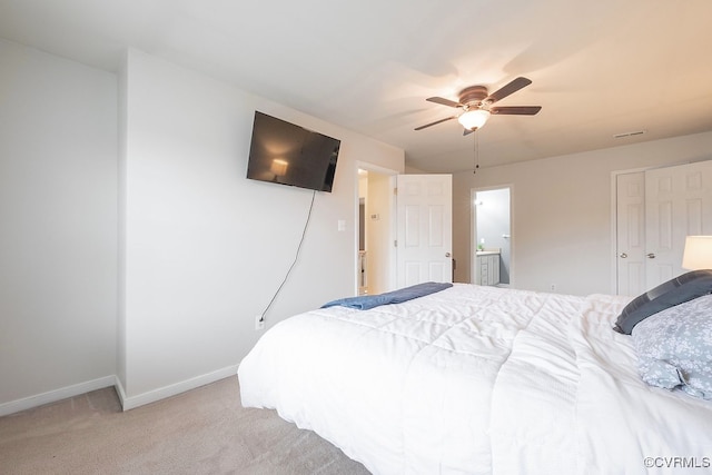 7418 Whirlaway Dr, Midlothian, VA 23112 - bedroom featuring baseboards, light colored carpet, ensuite bath, and ceiling fan