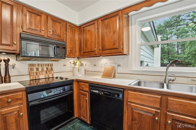 2545 Retrievers Ridge Rd, Henrico, VA 23233 - kitchen with black appliances, a sink, light countertops, brown cabinets, and decorative backsplash