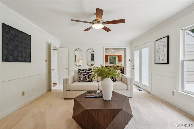 2545 Retrievers Ridge Rd, Henrico, VA 23233 - living area with light carpet, a ceiling fan, healthy amount of natural light, and crown molding
