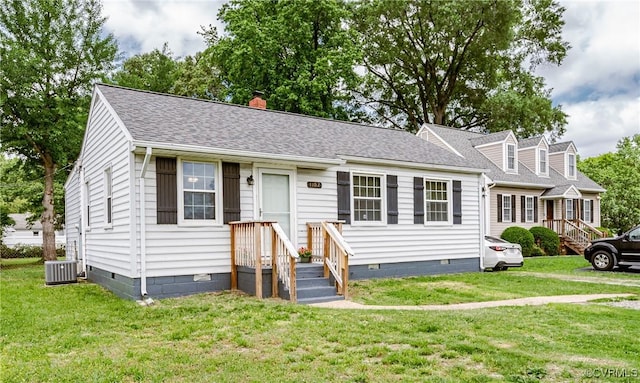 1102 Virginia Ave, Glen Allen, VA 23060 - view of front of house with crawl space, central AC unit, a front yard, a shingled roof, and a chimney