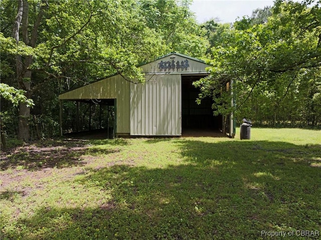 2480 Lees Neck Farm Rd, Saluda, VA 23149 - view of pole building featuring a yard and a view of trees