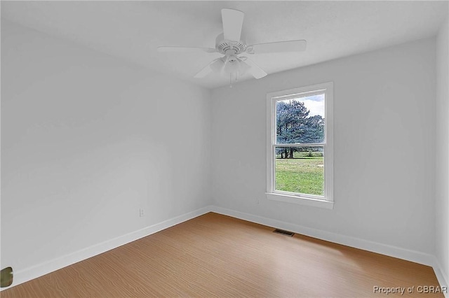2480 Lees Neck Farm Rd, Saluda, VA 23149 - empty room featuring baseboards, wood finished floors, and ceiling fan