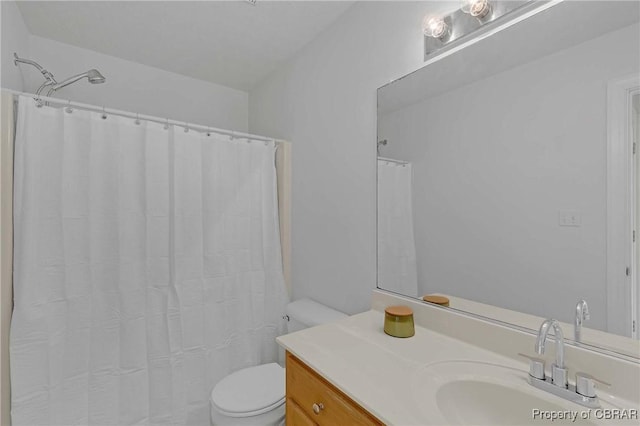 2480 Lees Neck Farm Rd, Saluda, VA 23149 - bathroom with toilet, vanity, and a shower with shower curtain