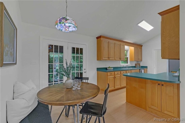 2480 Lees Neck Farm Rd, Saluda, VA 23149 - kitchen featuring a sink, vaulted ceiling, light wood-style flooring, and plenty of natural light