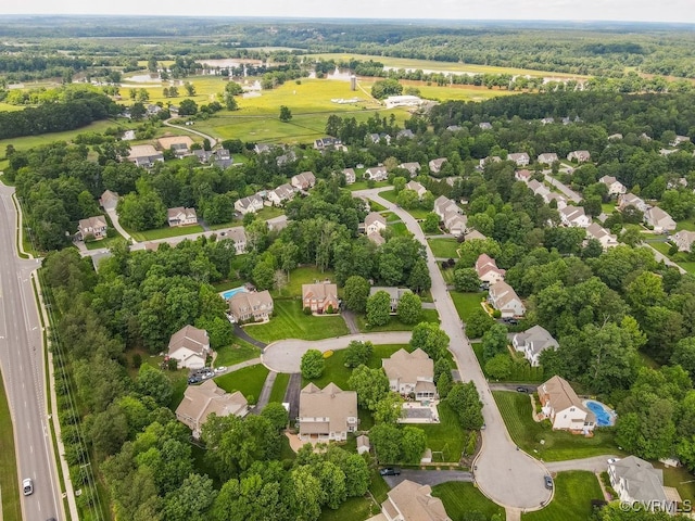 aerial overview of property's location featuring nearby suburban area