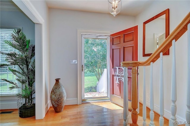 29507 Monroe Rd Unit 1, Franklin, VA 23851 - entrance foyer featuring wood finished floors, stairs, and baseboards
