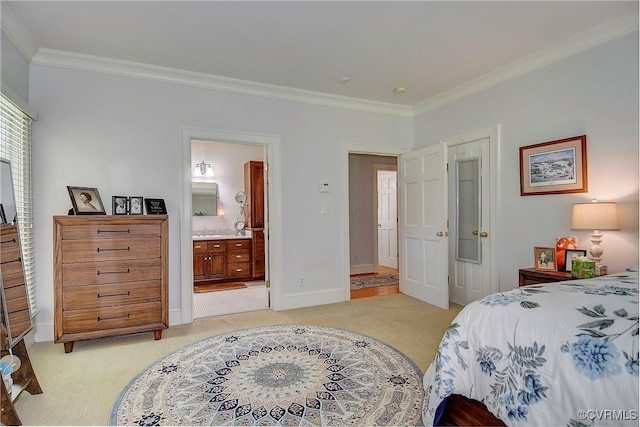 29507 Monroe Rd Unit 1, Franklin, VA 23851 - bedroom featuring ornamental molding, light colored carpet, baseboards, a sink, and ensuite bath