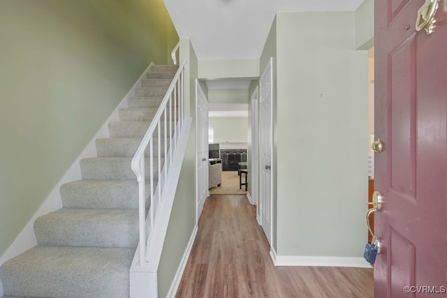 11693 Timberly Waye, Richmond, VA 23238 - foyer entrance with wood finished floors, stairway, and baseboards